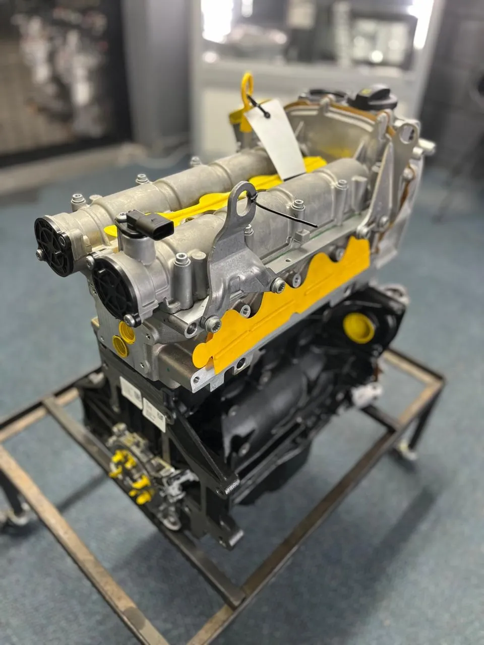 Close-up of yellow used engine inside Motors & More Gqeberha